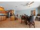 Open-concept kitchen featuring a dining area, stainless steel appliances, and views into other living spaces at 259 Fields Ter, Port Charlotte, FL 33952