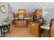 Spacious kitchen with a large center island, tile floors, and stainless steel appliances at 259 Fields Ter, Port Charlotte, FL 33952