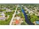 Beautiful aerial view of a waterfront community with lush landscaping and canal access at 2626 Auburn Blvd, Port Charlotte, FL 33948