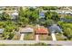 Waterfront homes along canal feature lush landscaping and private docks for enjoying the serene waterway at 2626 Auburn Blvd, Port Charlotte, FL 33948