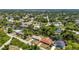This aerial view showcases the home's proximity to a waterway, perfect for boaters and nature enthusiasts at 2626 Auburn Blvd, Port Charlotte, FL 33948