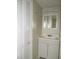 Bathroom vanity with storage and a large mirror at 26430 Rampart Blvd # 511, Punta Gorda, FL 33983