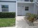 Exterior shot of the front entrance of the building featuring the door with the number 511 at 26430 Rampart Blvd # 511, Punta Gorda, FL 33983