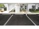 Assigned parking space with easy access to the well-maintained building and attractive landscaping at 26430 Rampart Blvd # 511, Punta Gorda, FL 33983