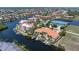 Beautiful waterfront neighborhood showcasing multiple docks, waterway, and red tiled roofs at 3314 Wood Thrush Dr # 124, Punta Gorda, FL 33950