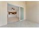 Balcony view from a sliding door, overlooking indoor area and kitchen at 3314 Wood Thrush Dr # 124, Punta Gorda, FL 33950