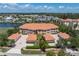 Gorgeous condo building with beautiful tile roof, well maintained landscaping and individual garages at 3314 Wood Thrush Dr # 124, Punta Gorda, FL 33950