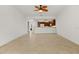 Spacious open-concept living area boasts tile floors and skylight over the dining area at 3314 Wood Thrush Dr # 124, Punta Gorda, FL 33950