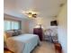 Inviting bedroom with a ceiling fan, natural light, and a cozy atmosphere at 3518 Terin Ct, Punta Gorda, FL 33950