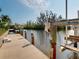 This home features a boat lift so you can easily access the waterfront at 3518 Terin Ct, Punta Gorda, FL 33950