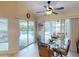 Bright breakfast nook with pool view, tile floor and ceiling fan at 3518 Terin Ct, Punta Gorda, FL 33950