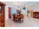 Well-lit dining room features a window and access to other living spaces at 3518 Terin Ct, Punta Gorda, FL 33950