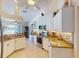 Well-lit kitchen with sleek appliances, granite counters, and white cabinetry, offers style and functionality at 3518 Terin Ct, Punta Gorda, FL 33950