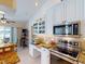 Stylish kitchen featuring granite counters, stainless appliances and bright white cabinets at 3518 Terin Ct, Punta Gorda, FL 33950
