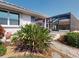 Close up shot of lush landscaping with stone pathway at 3518 Terin Ct, Punta Gorda, FL 33950