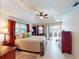 Spacious main bedroom with a ceiling fan, natural light, and access to the lanai at 3518 Terin Ct, Punta Gorda, FL 33950