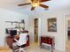 Home office features a built-in desk, shelving, and a comfortable workspace at 3518 Terin Ct, Punta Gorda, FL 33950