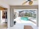 The covered patio area overlooks the pool and spa at 3518 Terin Ct, Punta Gorda, FL 33950