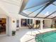 Outdoor pool and patio area, perfect for relaxing and entertaining at 3518 Terin Ct, Punta Gorda, FL 33950