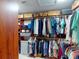 Walk-in closet with extensive built-in shelving and ample space for organized storage at 3518 Terin Ct, Punta Gorda, FL 33950