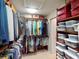 Walk-in closet with extensive built-in shelving and ample space for organized storage at 3518 Terin Ct, Punta Gorda, FL 33950