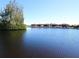 A scenic view of waterfront homes with boat docks on a canal at 3518 Terin Ct, Punta Gorda, FL 33950