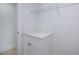 Walk-in closet featuring white walls, a built-in counter, and wire shelving at 359 Salisbury St, Port Charlotte, FL 33954