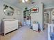 This well-organized bedroom features a closet, dresser, ceiling fan, and playroom decor at 4092 Troost St, North Port, FL 34288