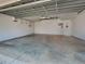 Spacious and clean garage with ample room for parking and storage at 4092 Troost St, North Port, FL 34288