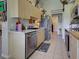 Bright kitchen with stainless steel appliances, granite countertops, and plenty of cabinet space at 4092 Troost St, North Port, FL 34288