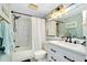 Updated bathroom with shower and tub combo and contemporary finishes at 410 Cerromar S Cir # 240, Venice, FL 34293