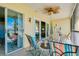 Inviting patio featuring sliding glass doors and plenty of room for seating at 410 Cerromar S Cir # 240, Venice, FL 34293