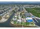 Wide aerial view of waterfront community with easy access to bays and gulf at 4409 Crews Ct, Port Charlotte, FL 33952