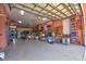 Spacious three car garage with epoxy flooring for storage, vehicles, and hobbies at 4409 Crews Ct, Port Charlotte, FL 33952