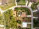 Aerial view of the property and backyard pool, outlined in red to show property boundaries at 4443 Abcor Rd, North Port, FL 34286