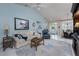 Inviting living room with comfortable furnishings, stylish decor, and ample natural light at 4443 Abcor Rd, North Port, FL 34286