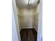 Walk-in closet offering wire shelving for optimal storage in a neutral color scheme with wood flooring at 5498 Montego Ln, Port Charlotte, FL 33981