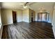 Spacious living room with hardwood floors, ceiling fan, neutral paint and lots of sunlight at 5498 Montego Ln, Port Charlotte, FL 33981