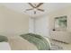 Bright bedroom with ceiling fan, modern furniture, and large closet at 6274 Skyview Dr, North Port, FL 34291