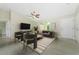 A modern living room featuring stylish furnishings and ample natural light at 6274 Skyview Dr, North Port, FL 34291