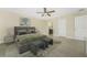 Spacious main bedroom with tile flooring, accent wall, and neutral palette for a serene ambiance at 6274 Skyview Dr, North Port, FL 34291