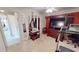 Bedroom featuring mirrored wall accents, a dresser, and exercise equipment at 7148 N Blue Sage, Punta Gorda, FL 33955