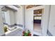 Welcoming entryway with white tile flooring, leading to the living room; bright and open concept at 7148 N Blue Sage, Punta Gorda, FL 33955