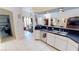 Spacious kitchen featuring stainless appliances, and views to the dining and living room at 7148 N Blue Sage, Punta Gorda, FL 33955