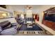 Spacious living room with high ceilings and comfortable leather furniture at 7148 N Blue Sage, Punta Gorda, FL 33955
