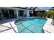 Backyard swimming pool with a paved deck and tropical landscaping at 7148 N Blue Sage, Punta Gorda, FL 33955