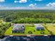 Aerial shot of a waterfront property, highlighting the spacious lot and private dock at 1025 Cheshire St, Port Charlotte, FL 33953
