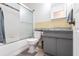 Bathroom with shower/tub combo and gray vanity at 10289 60Th N Cir, Pinellas Park, FL 33782