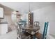 Cozy dining area featuring tiled floors and a rustic table set for four at 10289 60Th N Cir, Pinellas Park, FL 33782