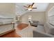Cozy living room featuring wood floors, vaulted ceilings, and stylish furnishings at 1039 Marlene St, Port Charlotte, FL 33952